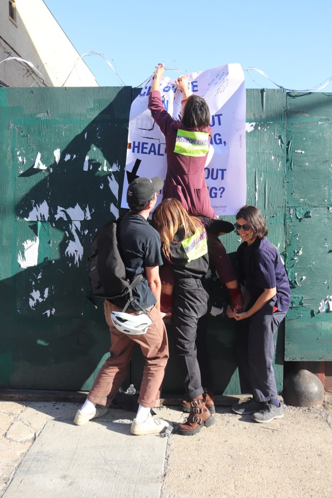 Installing a sign on a barbed wire fence